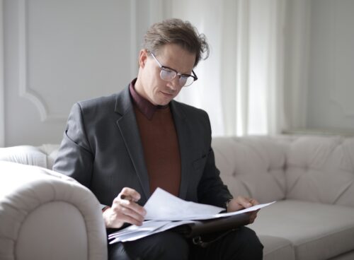 man reviewing documents